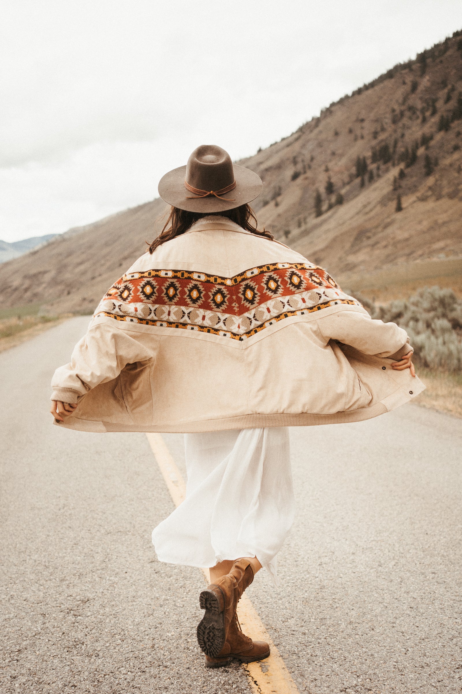 Back view of The Cream Rarebird Bomber Navajo Jacket, highlighting the detailed craftsmanship.